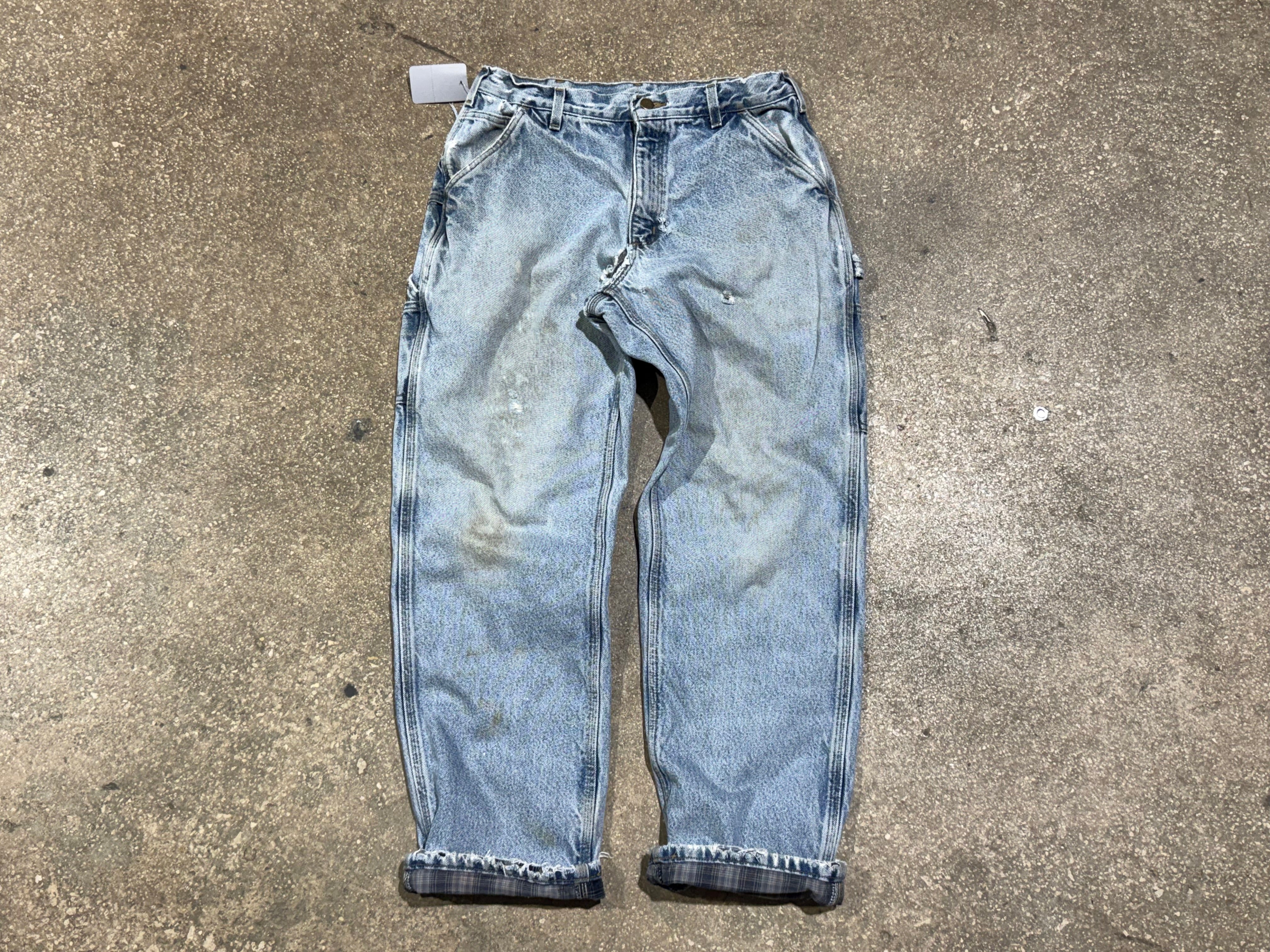 USED Distressed Carhartt Flannel Lined Denim - Light Wash Size 32x31